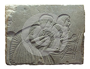 Ancient Egypt. Relief of Four scribes photo