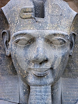 Ancient Egypt Statue Face of the Pharaoh Closeup photo