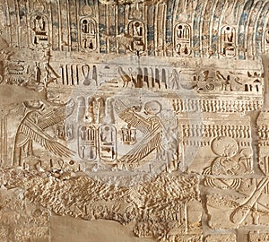 Ancient Egyptian art of hieroglyphs carving on stone