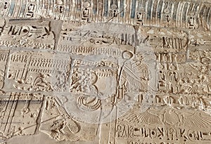 Ancient Egyptian art of hieroglyphs carving on stone