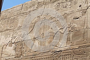 Ancient egyptian Hieroglyphics, ancient symbols, sculptures of pharaohs. Egyptian landmark. Luxor temple, Egypt