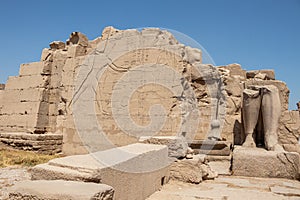 Ancient Egyptian murals and writings on the stone walls of the Karnak Temple in Luxor