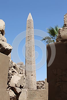 Ancient egyptian Obelisk at Karnak temple. Hieroglyphics, ancient symbols, pharaohs\' sculptures. Egyptian landmark. Egypt