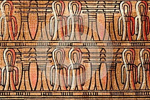 Ancient Egyptian ornament from old papyrus with symbols of lotus and ankh