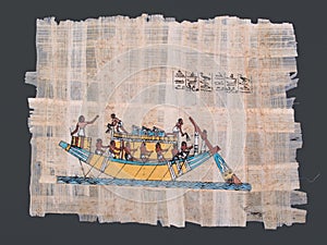 Ancient egyptian papyrus with boat and hieroglyphs