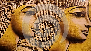 Ancient Egyptian portrait of couple on papyrus paper.