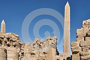 Ancient egyptian ruins with two obelisks in Luxor