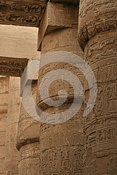 Ancient Egyptian temple columns with hieroglyphics