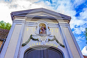 Ancient entrance of Beguinage Bridge (Begijnhofbrug) Bruges city Belgium