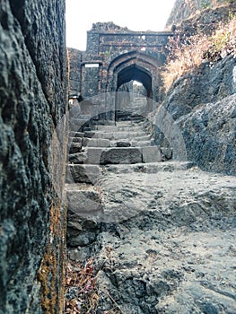Ancient Entrance Gate Of Lohagad Fort Structure and its surrounding Fortified walls (tatbandhi)