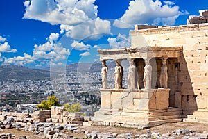 Ancient Erechtheion or Erechtheum temple with Caryatid Porch on the Acropolis, Athens, Greece. World famous landmark at the