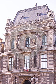Ancient facade of the Louvre in Paris
