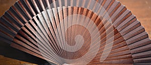 An ancient fan symbol of the traditional seduction of Spanish women photo