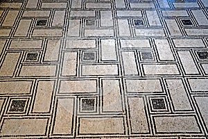 Ancient floor of a Roman domus with black and white mosaic, Brescia, Lombardy, Italy