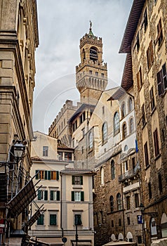 Ancient Florence cityscape and Palazzo Vecchio. View from the Piazza Del Grano street.  Florence , Tuscany,  Italy