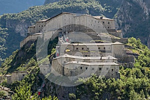 The ancient Forte di Bard, Aosta Valley, Italy, in the summer season photo