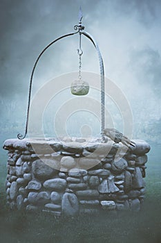 Ancient fountain in the fog