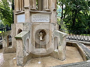 An ancient fountain in the park in the Teplice