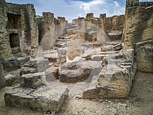 Ancient funerary caves located in the necropolis of The Tombs of the Kings. Paphos. Cyprus. photo