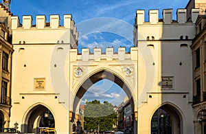 Ancient gate of Karistor in Munich, Bavaria, Germany. Front view of restored medieval gate of Munich at sunset