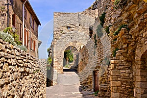 Ancient gate in the medieval walls of Saignon, Provence, France