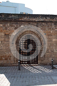 Ancient gate in stone wall. Nicosia, Cyprus