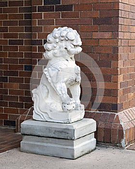 Ancient gaurdian Chinese foo dog at an entrance to the Anatole Hotel in Dallas, Texas.