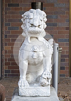 Ancient gaurdian Chinese foo dog at an entrance to the Anatole Hotel in Dallas, Texas.