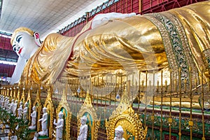 Ancient giant reclining Buddha in Chauk Htat Kyi Pagoda, Yangon, Myanmar