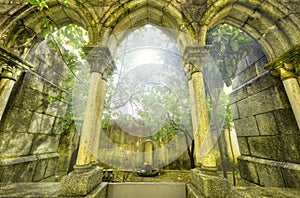 Ancient gothic arches in the myst. Fantasy landscape photo