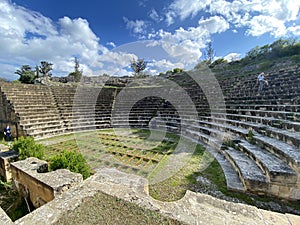 Ancient Greek Amphitheatre, Soli, Northern Cyprus. Blue skies and greenery photo