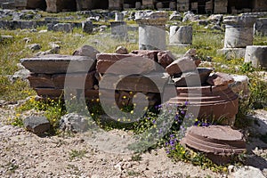 Ancient Greek columns parts at the archaeological site of Lindos Acropolis, Rhodes, Greece