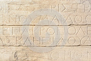 Ancient Greek inscription on marble in the Acropolis of Athens