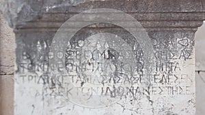 Ancient Greek script carved on stone plate, Patara,Turkey