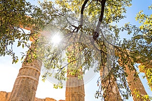 Ancient Greek temple pillars on a sunny day