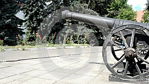 Ancient gun on wooden wheels