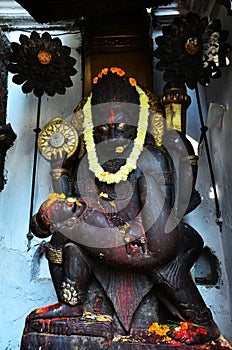 Ancient Hanuman idol deity angel statue at antique building Hanuman Dhoka Royal Palace at Basantapur Katmandu for nepali people photo