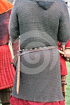 Ancient hauberk on the medieval knight`s back