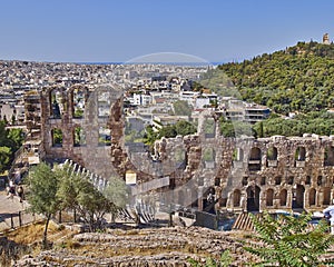 Ancient Herodeion theatre and Athens cityscape