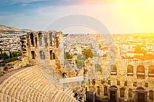 Ancient Herodes Atticus amphitheater with the cityscape on the background