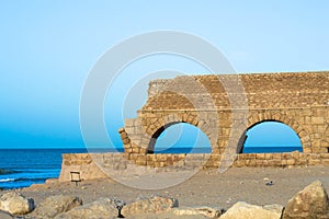 Ancient Herodian aqueduct at the seaside photo