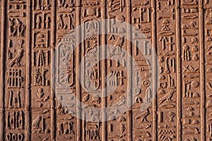 ancient hieroglyphs carved on a wall in kom ombo temple