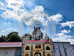 Ancient Hindu temple of lord anveerbhadreshawar, beautiful Dravidian style temple arch, colorful sculpture of Hindu god and