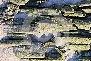 ancient historic wooden platform on the bank of the Northern Dvina River, for rafts logs collected timber floating drift