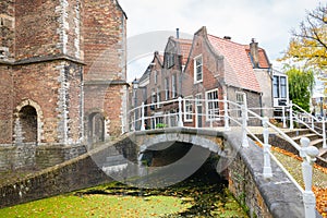 Ancient houses and bridge in Delft, Holland
