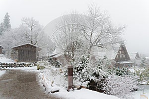 ancient houses and white snow is heavy and covered throughout S