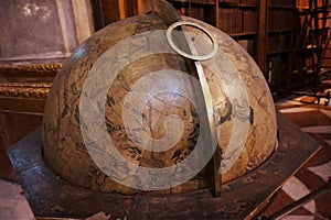 Ancient huge globe standing in the main hall of the National Austrian Library in the Hofburg Palace