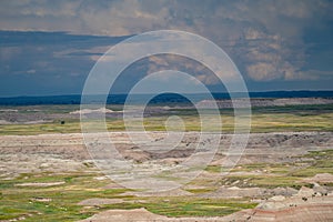 Ancient Hunters Overlook in Badlands National Park, as. a summer thunderstorm begins to roll through