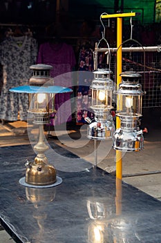 Ancient hurricane lamp Which is collectible, was included for the performance.