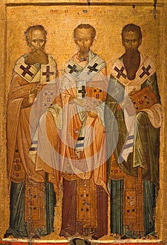 Ancient icon of The Three Hierarchs - Basil the Great,  Gregory the Theologian and John Chrysostom. Thessaloniki, Greece